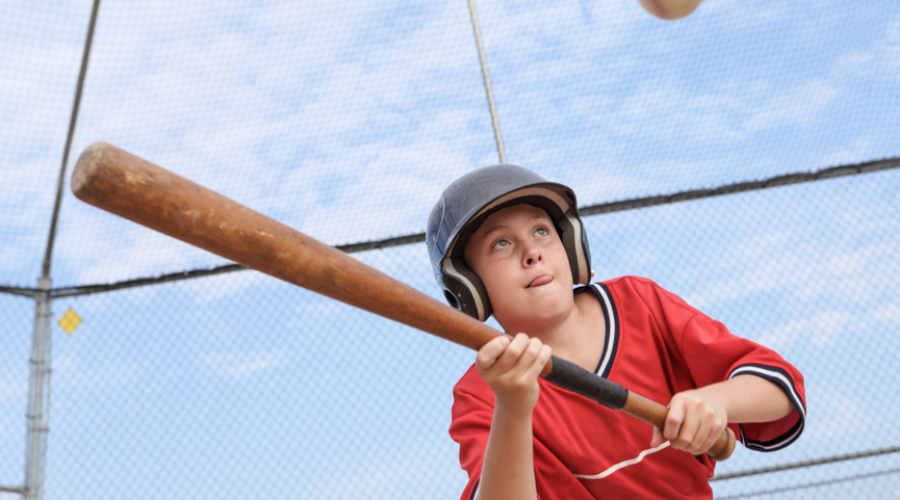 boy bunting baseball
